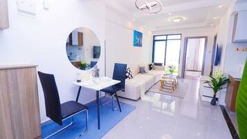 Comfort Apartment | Living area | 24-cm Smart TV with digital channels