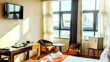Deluxe Room, 1 Double Bed | Minibar, in-room safe, desk, laptop workspace
