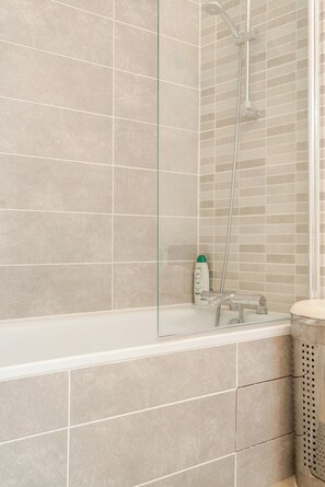 Eco-friendly toiletries, hair dryer, towels, soap