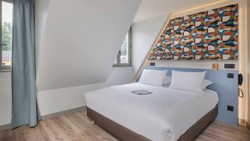 Chambre Classique | 1 chambre, coffres-forts dans les chambres, bureau, rideaux occultants