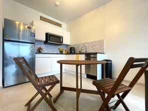 Microwave, stovetop, dishwasher, coffee/tea maker