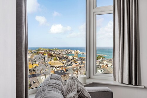 Introducing a stunning townhouse nestled in the prestigious locale of St. Ives