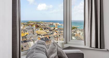 Introducing a stunning townhouse nestled in the prestigious locale of St. Ives