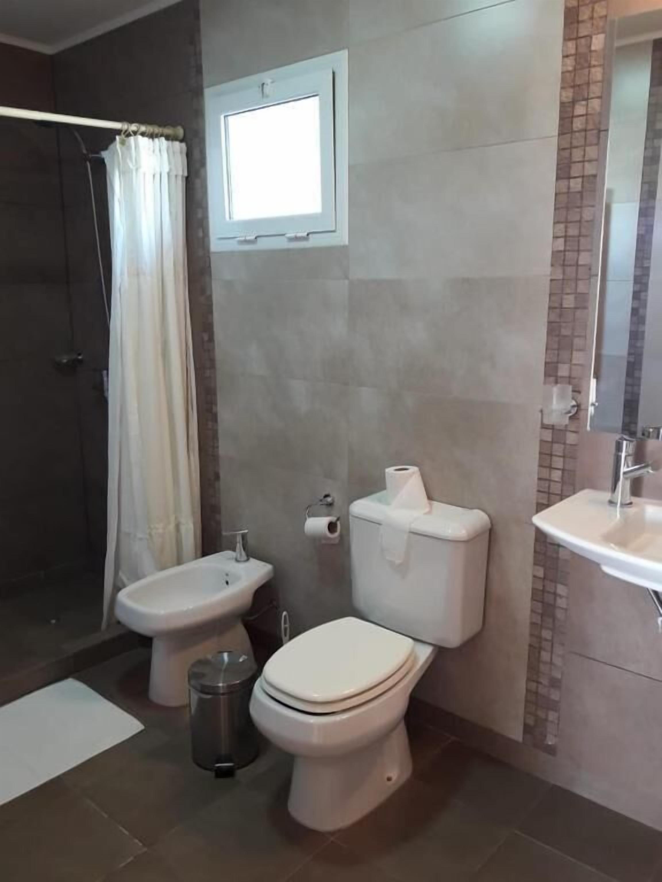 Bidet, towels, soap, shampoo