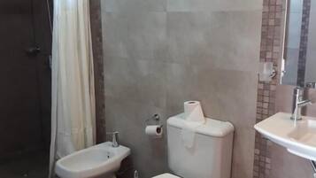 Bidet, towels, soap, shampoo