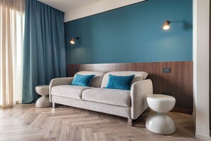 Suite – signature | Oppholdsområde | En 55-tommers smart-TV med digitale kanaler