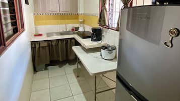 Fridge, microwave, stovetop, coffee/tea maker