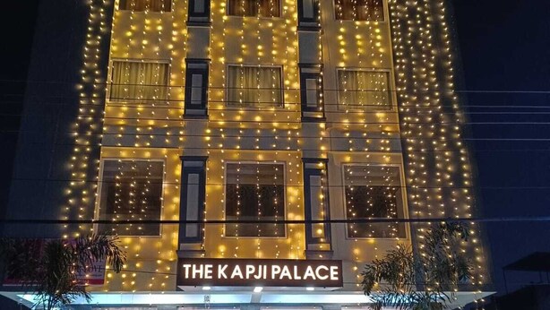 A building with multiple windows and a sign reading "The Kapji Palace". - The Kapji Palace (Jaipur)