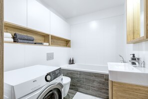Hair dryer, towels, soap, shampoo