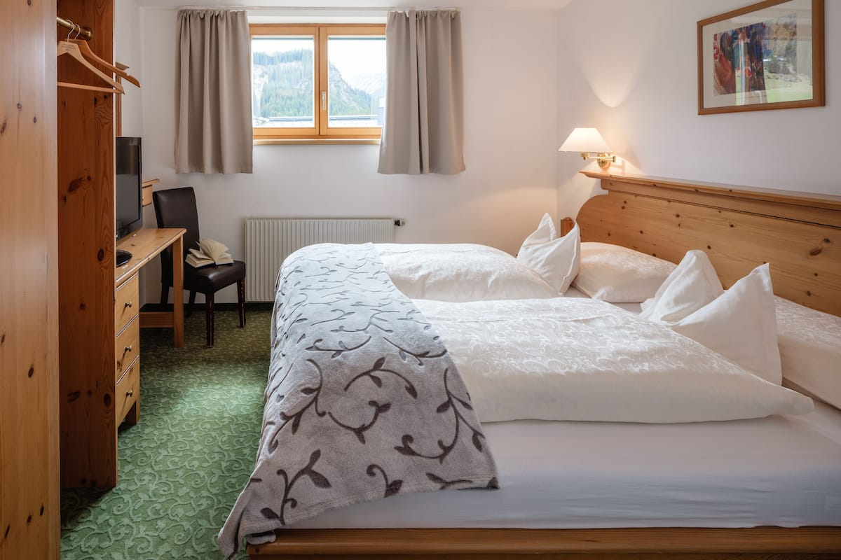 Apartamento, 1 cama King e sofá-cama | Cofres nos quartos, escrivaninha, cortinas blackout, Wi-Fi de cortesia