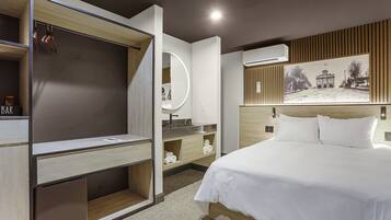 Economy Room | Down comforters, in-room safe, iron/ironing board, free WiFi