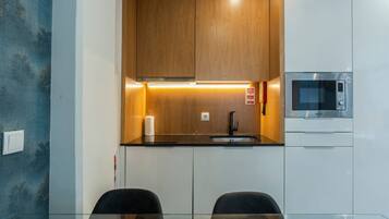 Fridge, microwave, coffee/tea maker, toaster