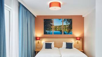 Premium bedding, pillowtop beds, in-room safe, laptop workspace