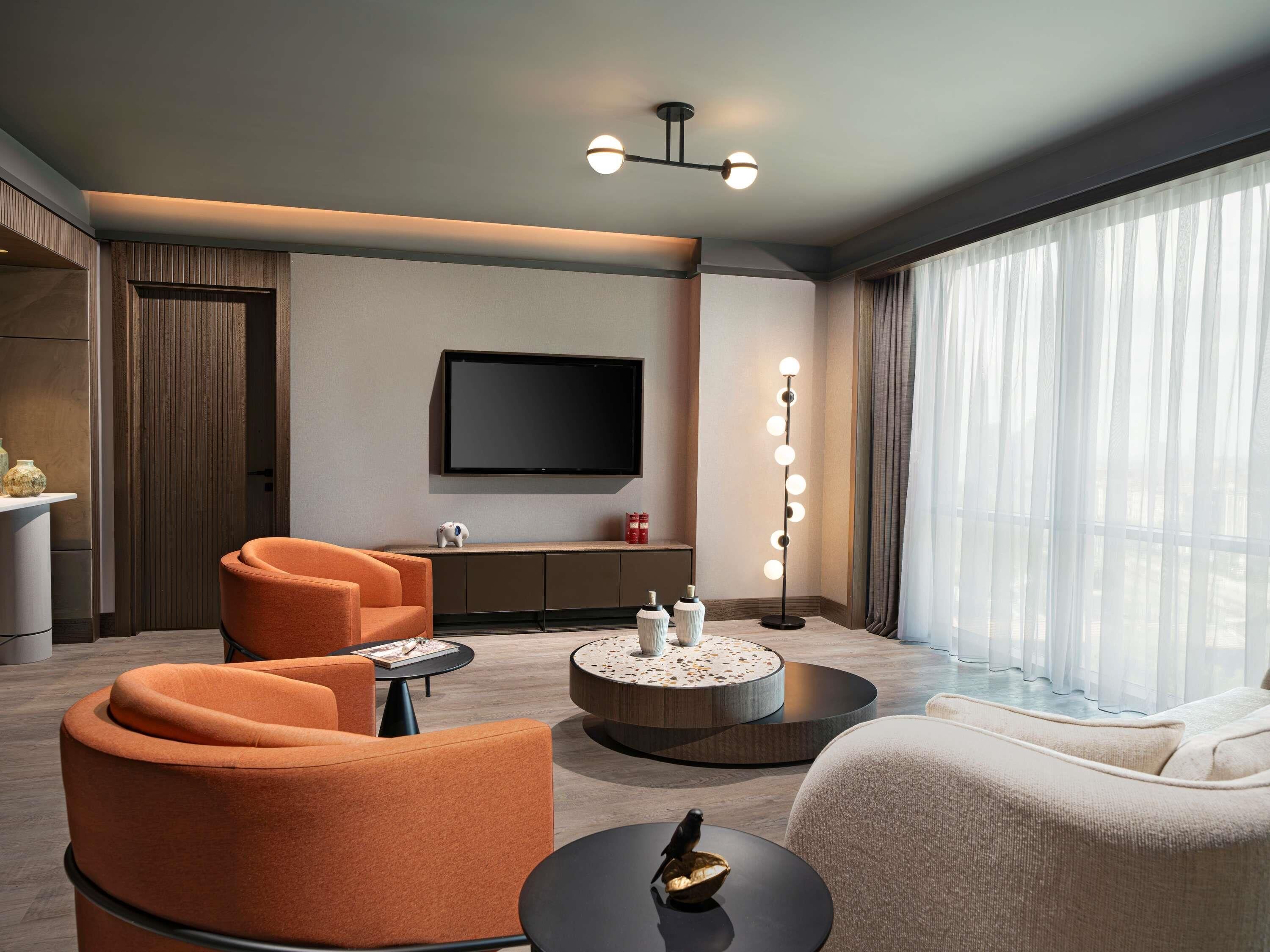 Apartamento executivo, 1 quarto | Roupas de cama premium, frigobar, cofres nos quartos, escrivaninha