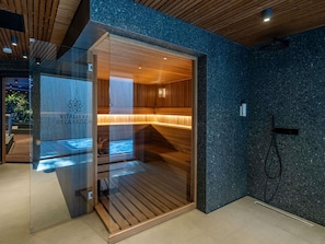 Un sauna, masajes con piedras calientes, masajes de tejido profundo