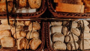 A display of various baked goods in baskets.