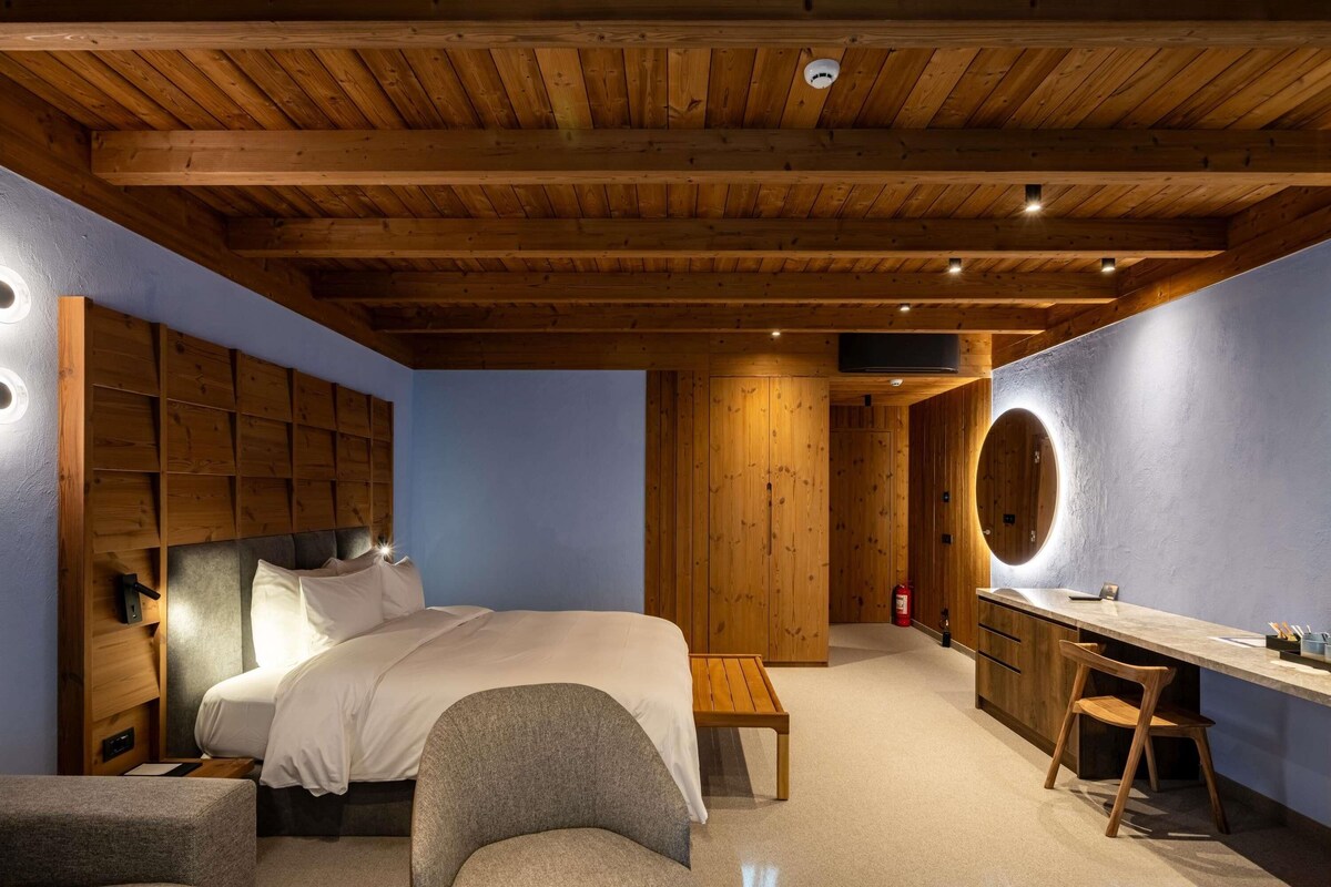 Chambre Deluxe, 1 lit double et 1 canapé-lit