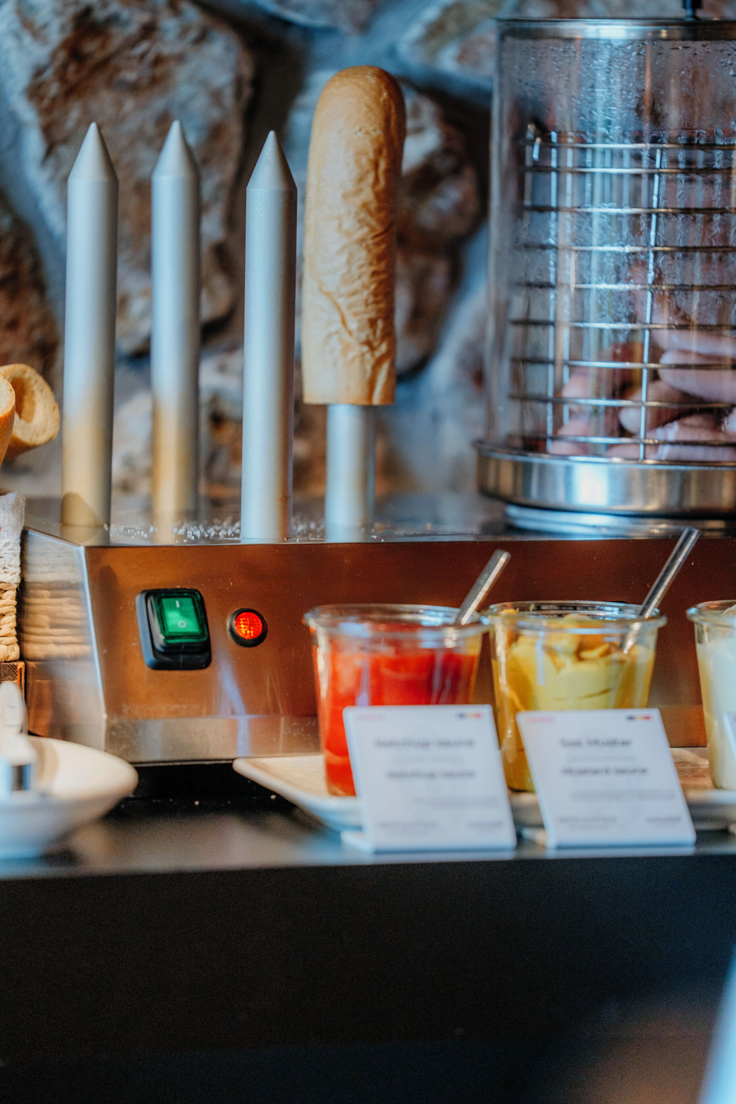 A coffee machine with a milk frother, a blender, and various drink containers.