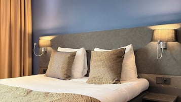 Literie hypoallergénique, coffres-forts dans les chambres, bureau