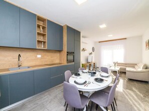 House (Three Bedroom Holiday Home with Jacuz) | Dining room