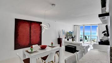 Luxury Condo | Living area | 50-inch Smart TV with cable channels