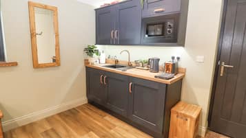 Fridge, electric kettle, toaster, cookware/dishes/utensils