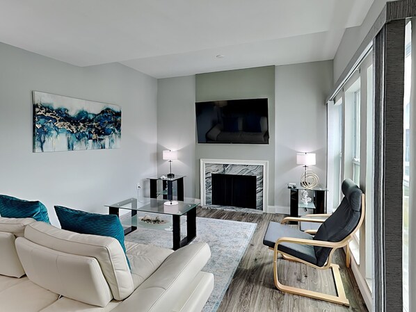 Condo, Multiple Beds, Pool Access (unit 247G) | Living area | TV, fireplace - Madeira Beach Yacht Club 247g (Madeira Beach)