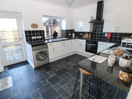 Fridge, electric kettle, toaster, cookware/dishes/utensils