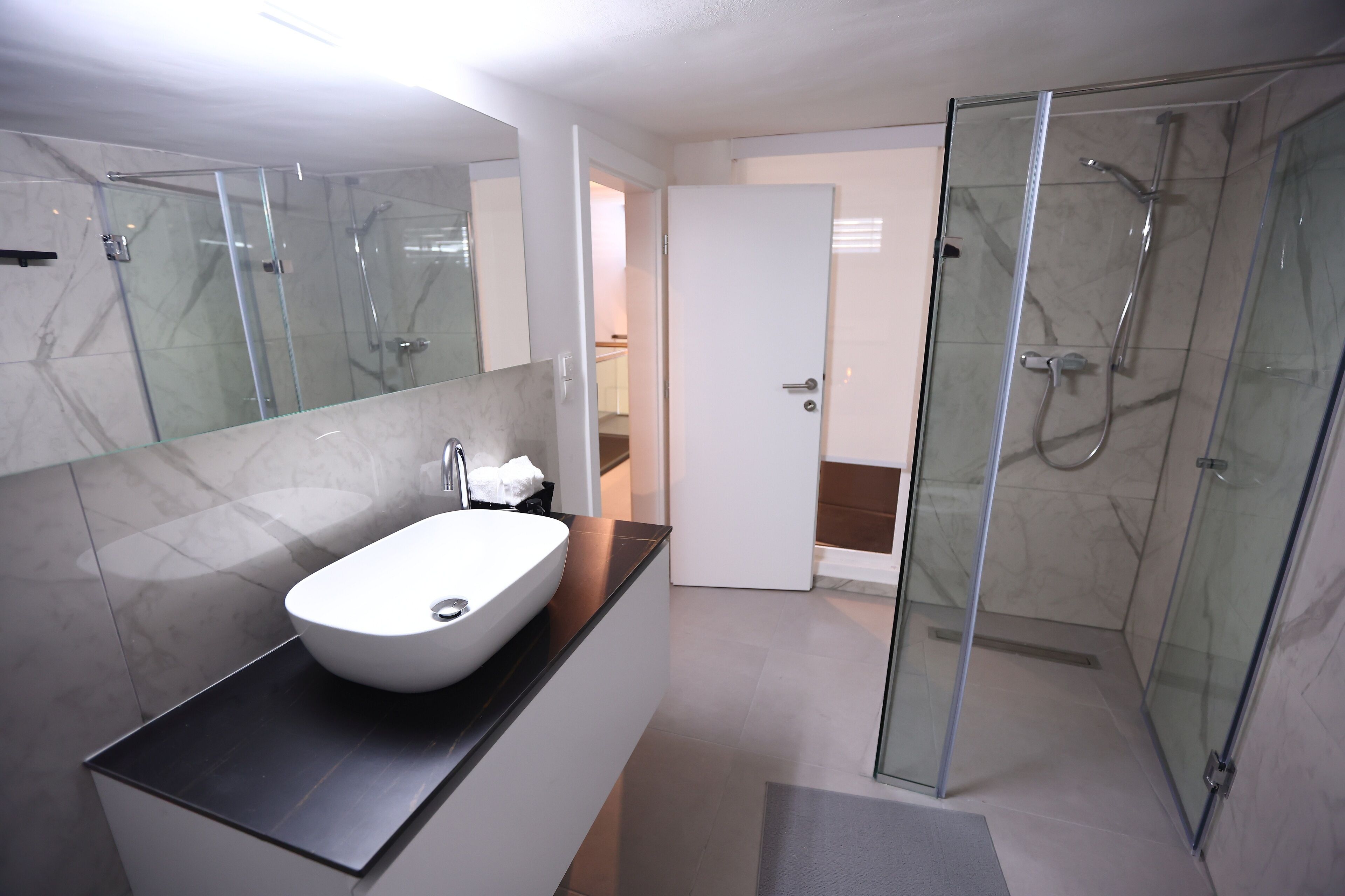 Shower, towels, soap, shampoo