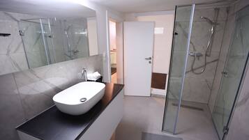 Shower, towels, soap, shampoo
