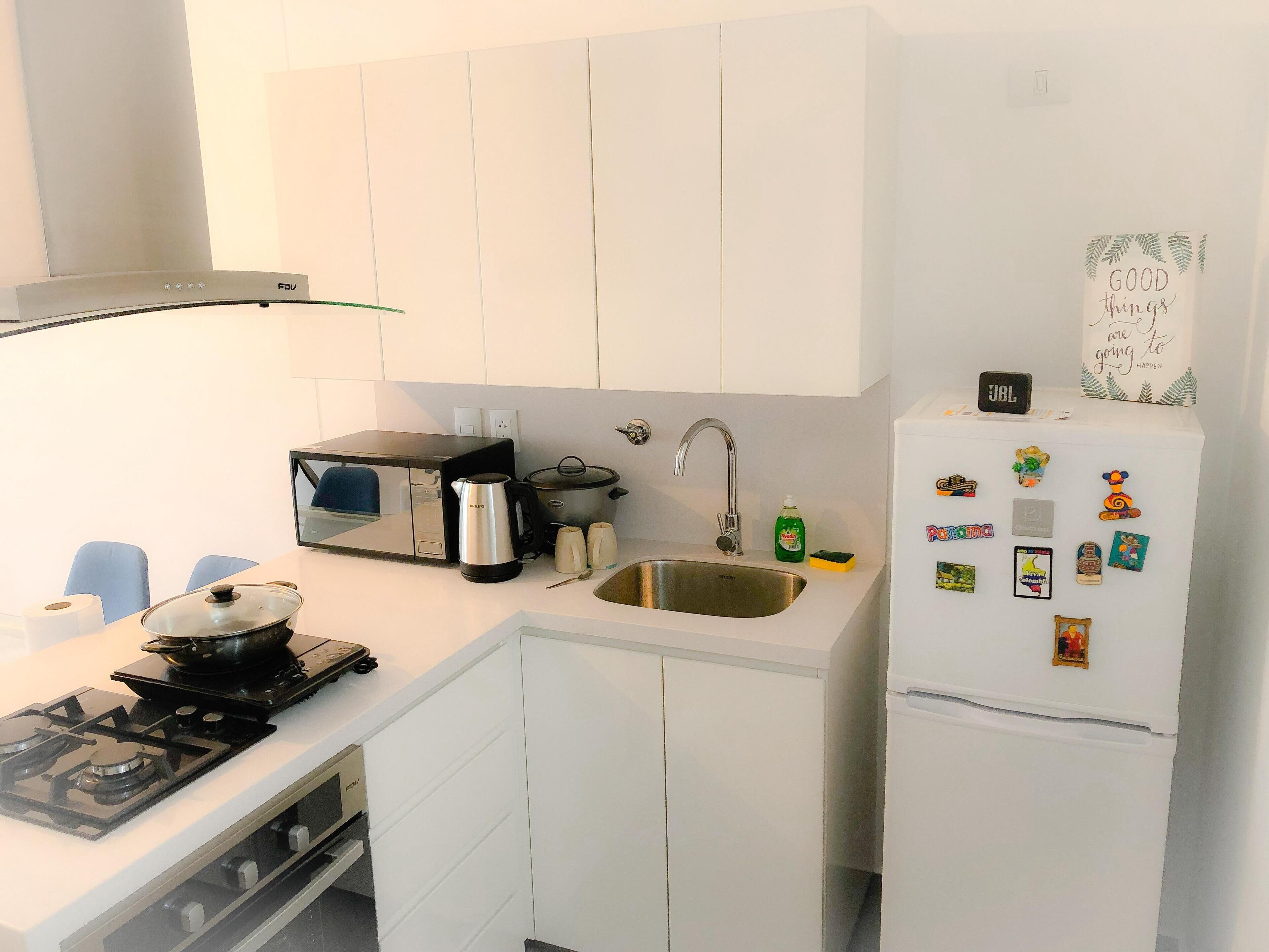 Fridge, microwave, stovetop, coffee/tea maker