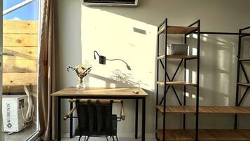 Design Studio Suite | Individually decorated, individually furnished, desk, laptop workspace