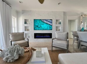 Smart TV, fireplace, books