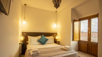 Minibar, fer et planche à repasser, lits bébé (en supplément)