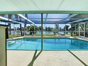 Outdoor pool, a heated pool - Lakefront Paradise, with Heated Private Pool. (Holiday)