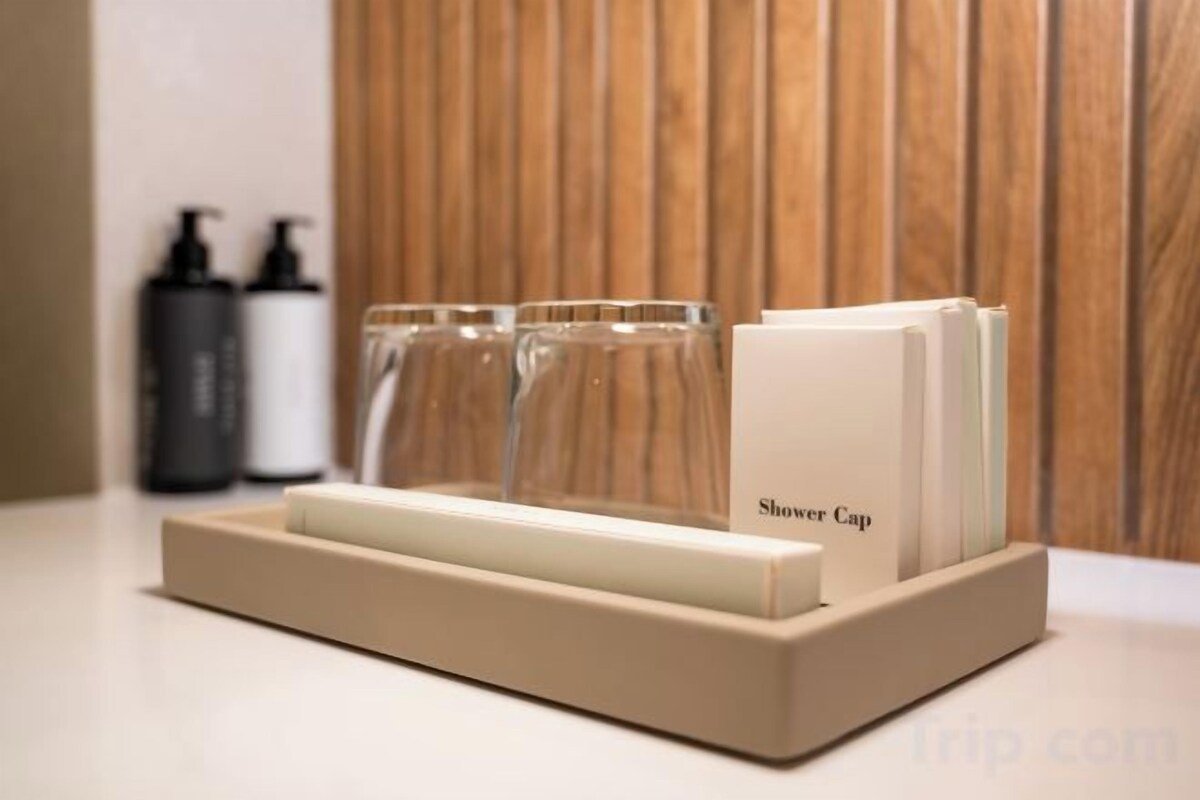 Bathroom amenities | Rainfall showerhead, free toiletries, hair dryer, bathrobes