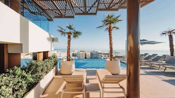 Indoor pool, outdoor pool, pool umbrellas, sun loungers