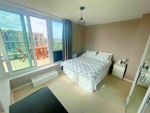 Departamento | 1 habitación, tabla de planchar con plancha, wifi gratis y ropa de cama