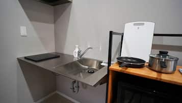Fridge, microwave, stovetop, cookware/dishes/utensils