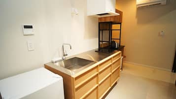 Fridge, microwave, stovetop, cookware/dishes/utensils