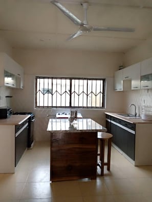 Apartment | Private kitchen | Fridge, microwave, oven, stovetop