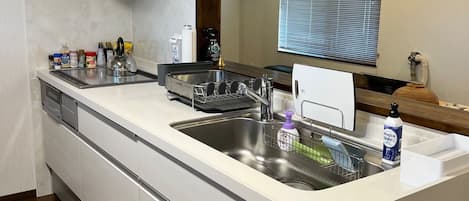 Fridge, microwave, stovetop, cookware/dishes/utensils