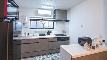 Fridge, microwave, cookware/dishes/utensils