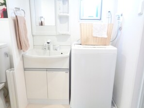 Hair dryer, towels, soap, shampoo