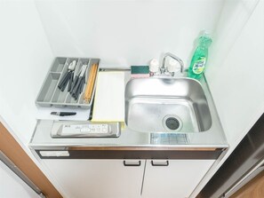 Fridge, microwave, stovetop, cookware/dishes/utensils