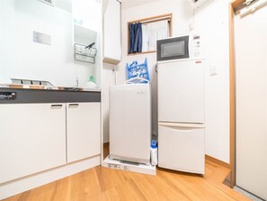 Fridge, microwave, stovetop, cookware/dishes/utensils