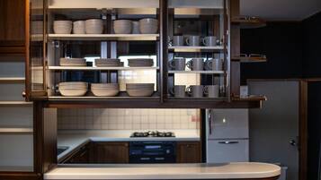 Fridge, microwave, stovetop, cookware/dishes/utensils