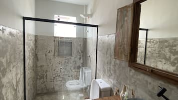 Shower, hair dryer, towels, soap