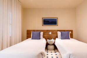 Kamar Double atau Twin Deluks, 2 Tempat Tidur Twin | Seprai premium, selimut bulu angsa, busa memori, dan minibar