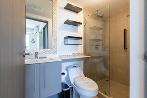 Shower, hair dryer, towels, soap